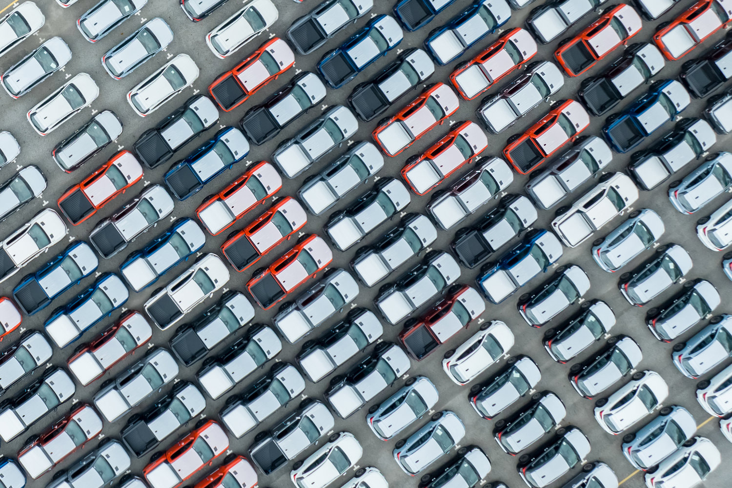 rows of cars filling parking lot